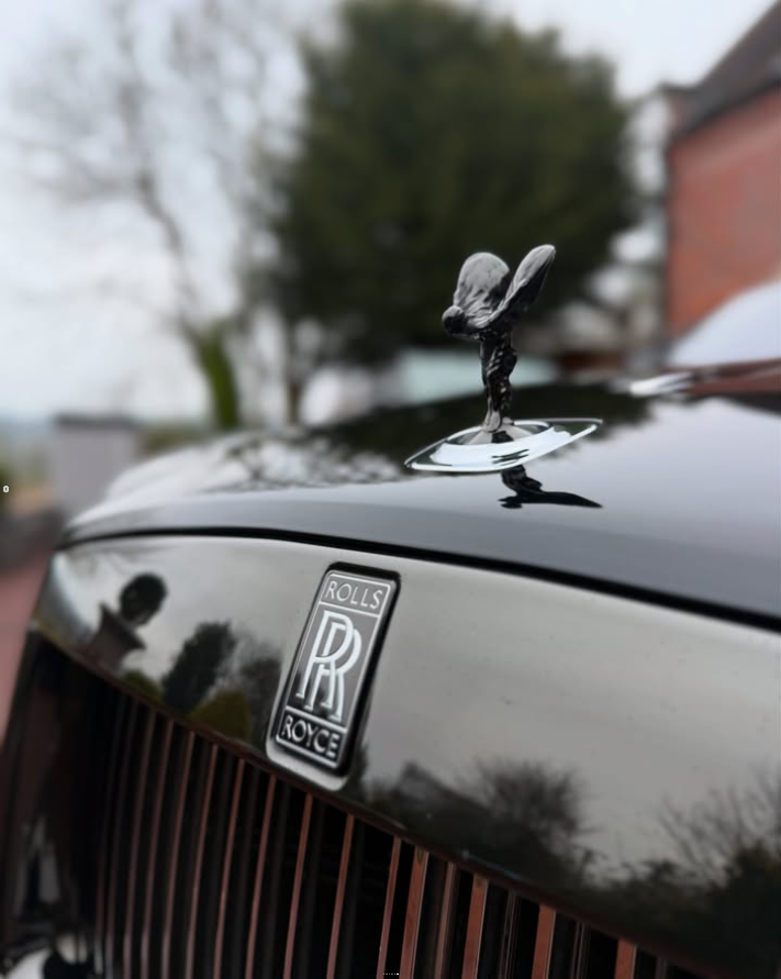 Close up of a Rolls Royce grille and bonnet ornament after a JW Valets detail