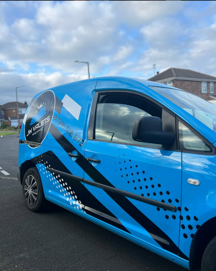JW Valets branded van on site at a customer's driveway